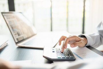 Confident asian business man Auditor or internal revenue service staff checking annual financial...