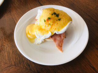Dish of yummy Eggs Benedict.