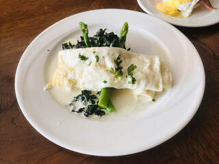 Dish of Egg white omelette served with asparagus.
