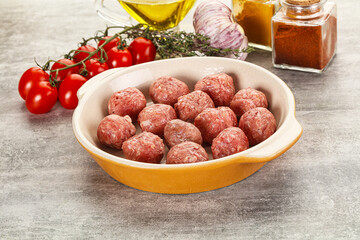 Uncooked raw beef meatball minced