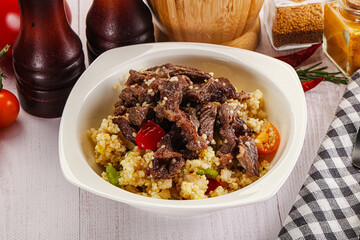 Traditional couscous with beef and vegetables