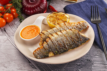 Grilled seabass fillet with lemon