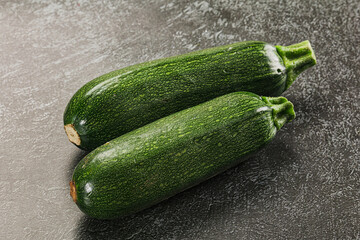 Raw green ripe zucchini vegetable