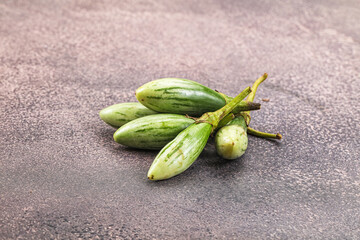 Small organic young green eggplant