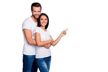 Pair in love standing piggy back indicating on crazy sale wear casual outfit isolated blue...