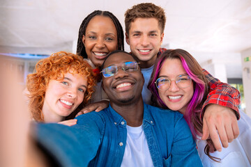 Group of students, meet on university campus work together on creative tasks, prepare for university exams, use laptop. Education, study of university life concept.