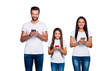 Photo of foster family with telephones in hands wear casual outfit isolated blue background