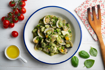 Green beans with clams and hard-boiled egg. Top view table with  decorations.