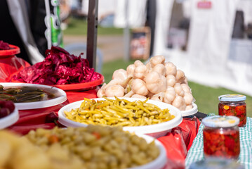 homemade vegetable pickles,Stand with mixed pickles at an open-air market