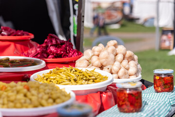 homemade vegetable pickles,Stand with mixed pickles at an open-air market
