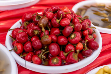 homemade vegetable pickles,Stand with mixed pickles at an open-air market