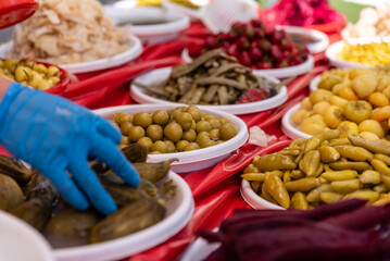 homemade vegetable pickles,Stand with mixed pickles at an open-air market