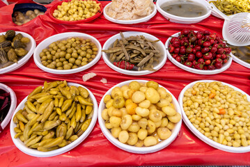 homemade vegetable pickles,Stand with mixed pickles at an open-air market