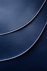 A deep navy leather background with a subtle, thin silver curve running along the bottom, blending elegance with minimalism. 