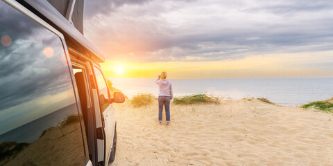 Transporter Camping Van bus at the California Ocean in the coastal Nature