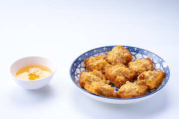 Delicious Golden Fried Dumplings with Dipping Sauce