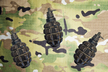 Hand grenades on military background