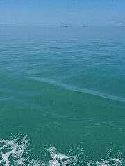 
It is a sea surface with foam.