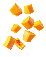 Fresh tropical pumpkin cubes floating in mid-air, a vibrant display of nature’s colors