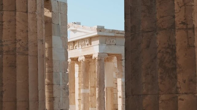 Temple of Athena Nike with columns on the Acropolis in Athens, Greece. Fully Ionic temple on the Acropolis. Popular travel destination
