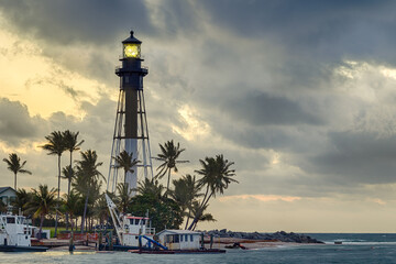 Lighthouse Point Lighthouse Illuminated Against a Vibrant Coastal Sunrise  