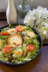 fresh salad with goat's cheese taler