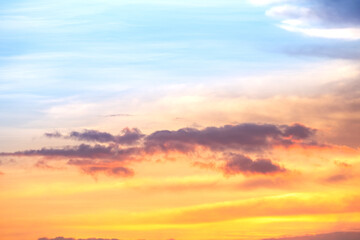 Fototapeta premium Beautiful , luxury soft gradient orange gold clouds and sunlight on the blue sky perfect for the background, take in everning,Twilight, Large size, high definition landscape photo
