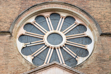 Details of rose window on the facade of San Domenico Basilica (Saint Dominic) in Bologna, Italy