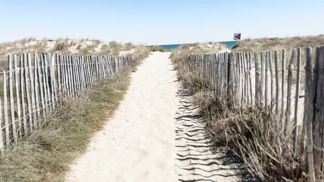 White sandy path to the beach.