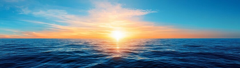 Obraz premium Breathtaking sunset over the calm ocean, highlighting vibrant colors of the sky and serene water in a tranquil setting.