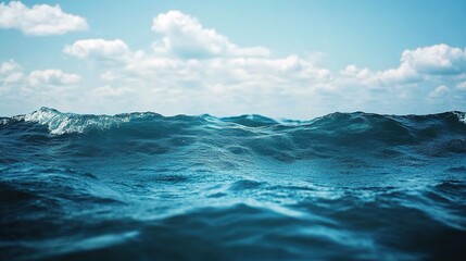 Serene Ocean Waves Under Blue Sky