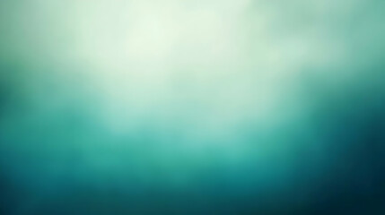 Blurred gradient emerald green to teal abstract background