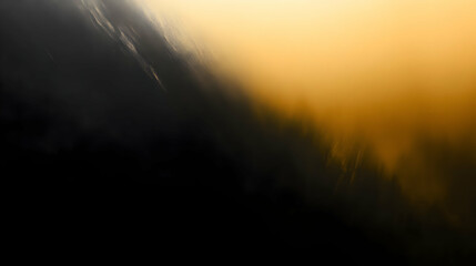 Fototapeta premium Blurred gradient black to mustard abstract background