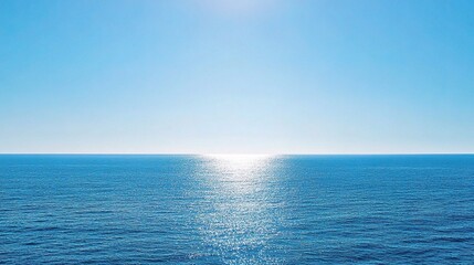 Obraz premium Serene Blue Ocean Under Clear Sky