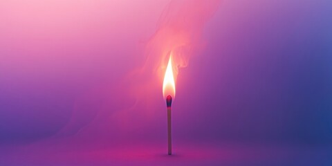 Fototapeta premium A matchstick is lit and the flame is yellow