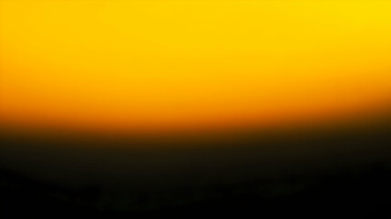 Obraz premium Blurred gradient black to yellow abstract background