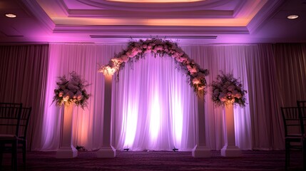 Luxurious and Opulent Wedding Arch Backdrop Enhanced with Captivating Lighting Accents and Ornate Floral Garlands Creating a Magical and Celebratory Atmosphere