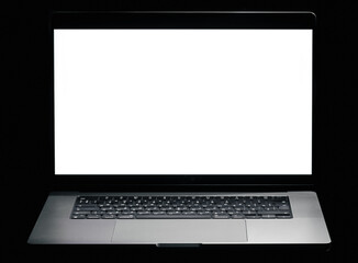 Modern laptop with blank white screen isolated on black background. Close up.