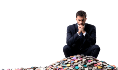 Businessman reflects on his financial challenges while surrounded by a pile of coins isolate on transparent background, png, cutout