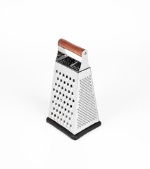Steel grater for food. Grate the product. Vegetable grater.