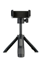 Assembled black tripod with phone mount on white background.