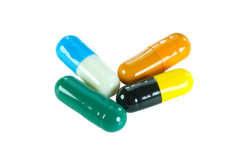 Multiple capsules isolated on transparent background.
