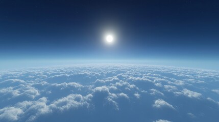 A bright sky above thin clouds, deep blue with a small bright sun just rising