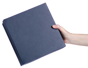 Black closed box, cardboard shoe in hand on a white background isolation