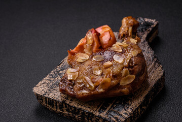 Duck leg baked with apples and sauce