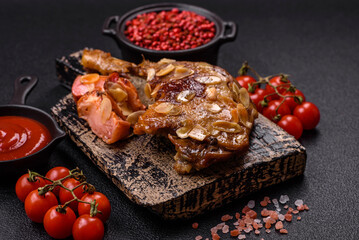 Duck leg baked with apples and sauce