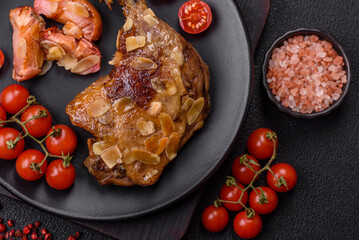 Duck leg baked with apples and sauce