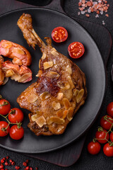 Duck leg baked with apples and sauce