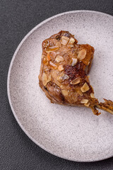 Duck leg baked with apples and sauce