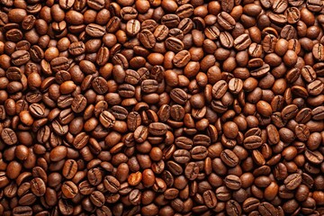 Obraz premium A close-up panoramic view of a coffee bean background